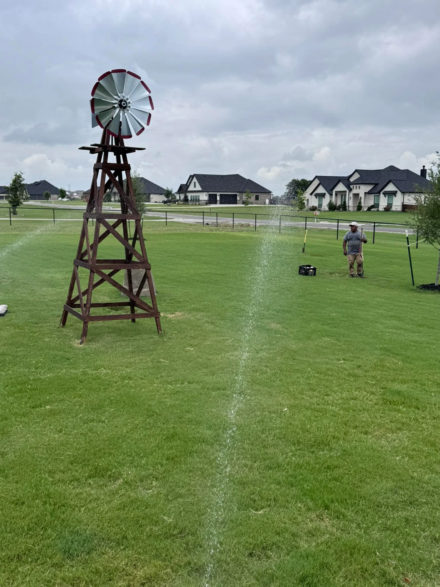Irrigation system installed across a manicured residential lawn in Weatherford, TX